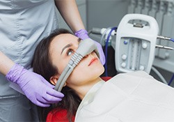 Female patient with nitrous oxide mask 